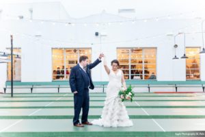 bride and groom dancing
